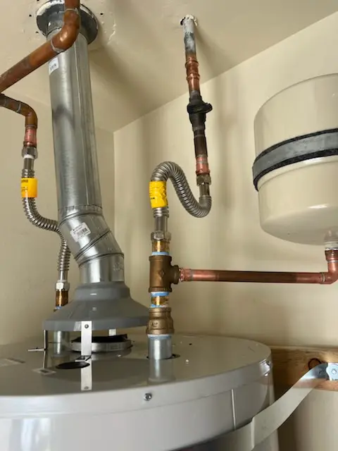 Water heater installation and plumbing repair in Clune